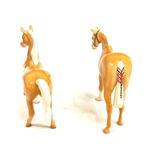 145 - 2 Beswick Palomino horses, over all good condition