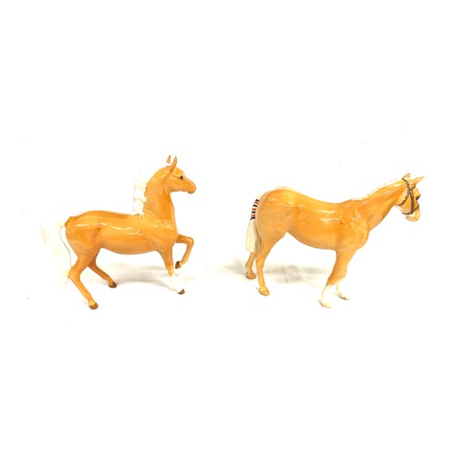 145 - 2 Beswick Palomino horses, over all good condition