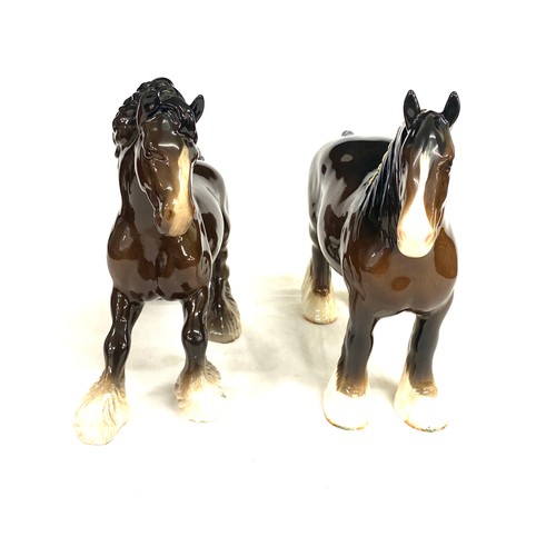 64 - Two Beswick shire horses, both in over all good condition