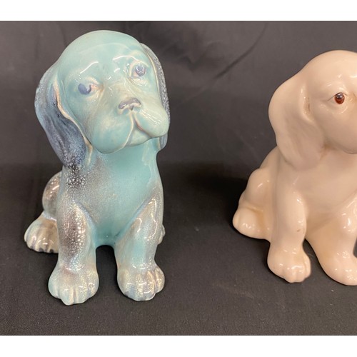 103 - Two Beswick dog 454 Lollopy seated dogs, over all good condition