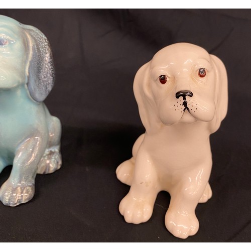 103 - Two Beswick dog 454 Lollopy seated dogs, over all good condition