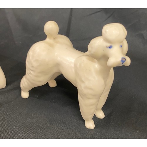 66 - Selection of 5 Beswick dogs includes Boxer, Poodle, Laborador, deluxe dog etc, all in over all good ... 