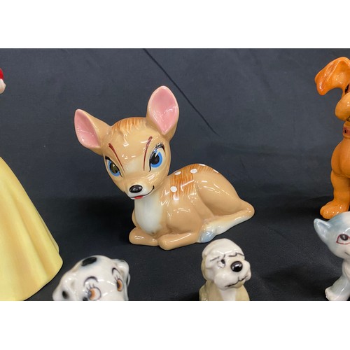 75 - Selection of assorted Disney figures includes Wade, Beswick etc, includes Snow white, Bambi, Scooty ... 