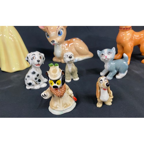 75 - Selection of assorted Disney figures includes Wade, Beswick etc, includes Snow white, Bambi, Scooty ... 