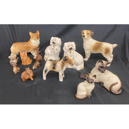 37 - Selection of 12 Vintage Beswick figures includes Rabbits, Koala, dogs etc all in over all good condi... 
