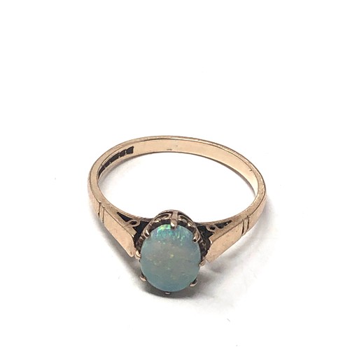 85 - 9ct gold opal ring weight 2.1g