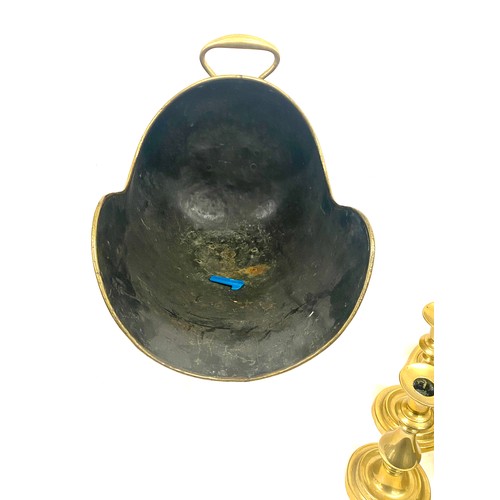 196 - Selection of brassware to include Helmet coal skuttle and  candlesticks