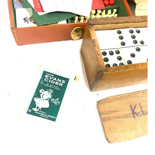 280 - A selection of vintage games to include a 1950s games compendium, a carved wooden chess piece set, d... 