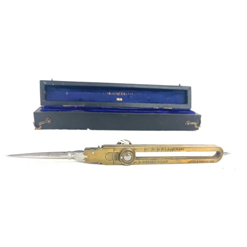 49 - Cased Aston & Mander, dated 1918 with broad arrow, brass drawing set of proportional dividers drafti... 