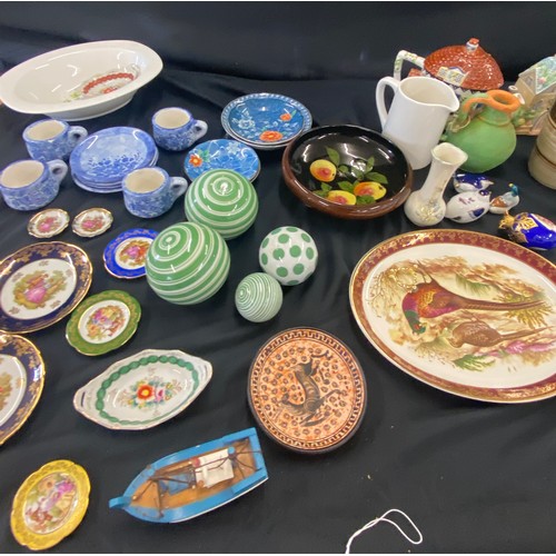 216 - Large selection of assorted pottery to include collectors plates, vases, teapots etc