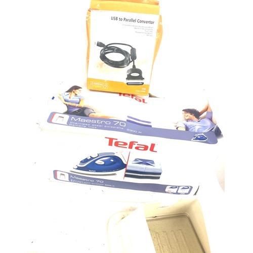 217 - Tefal iron in box, new shower head, heated pillow etc