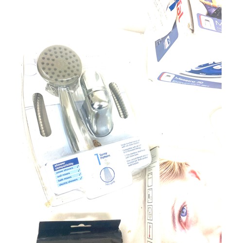 217 - Tefal iron in box, new shower head, heated pillow etc