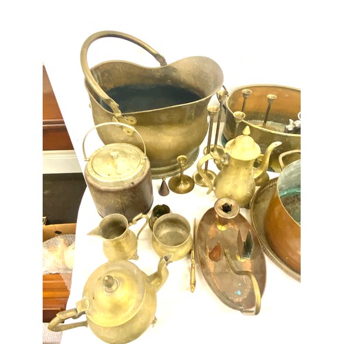 213 - Selection of brass and copper to include tea pots, coal scuttle etc