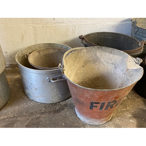 334 - Selection of Vintage galvanised buckets/ saucpans includes fire bucket etc