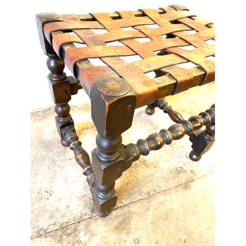 388 - Antique oak and leather foot stool measures approx 16 inches tall 16 inches wide depth 12 inches