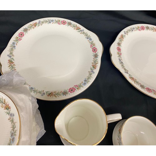 219 - Paragon Belinda tea set 6 setting to include 2 cake plates, milk jug, sugar bowl, 6 plates, cups and... 