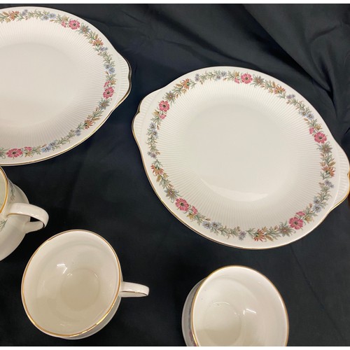 219 - Paragon Belinda tea set 6 setting to include 2 cake plates, milk jug, sugar bowl, 6 plates, cups and... 