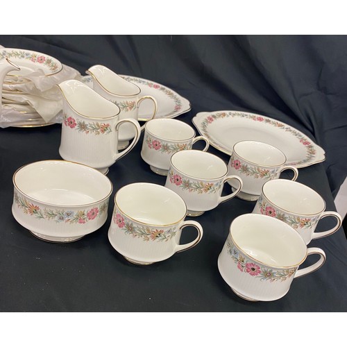 219 - Paragon Belinda tea set 6 setting to include 2 cake plates, milk jug, sugar bowl, 6 plates, cups and... 