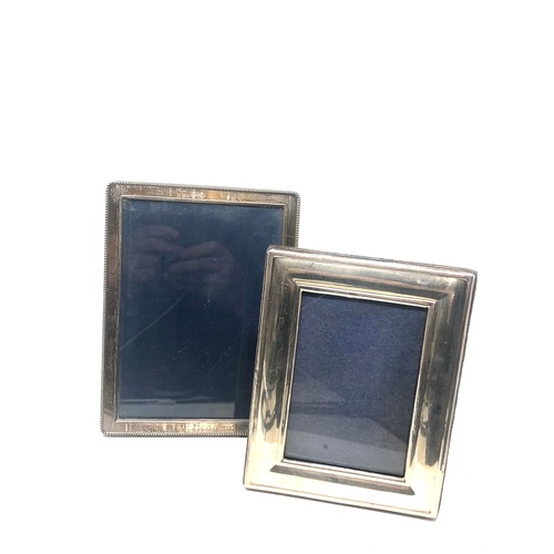 29 - 2 vintage silver picture frames largest measures approx 20.cm by 15cm