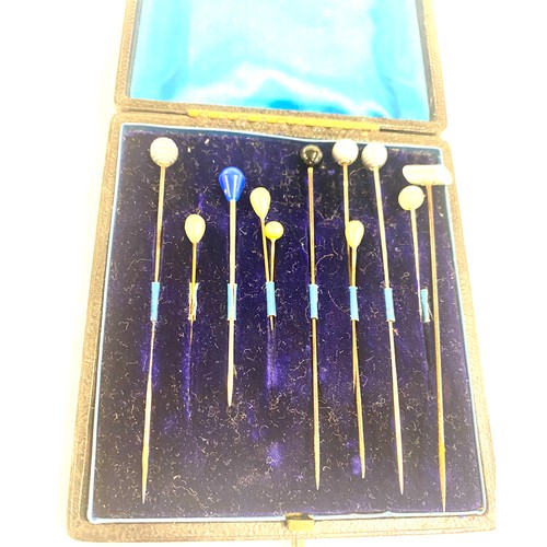 408 - Antique stick pin box with a selection of assorted stick pins