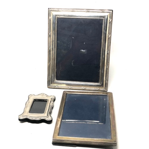 31 - 3 silver picture frames largest measures approx 25cm by 19cm