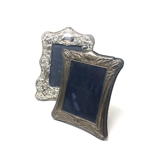 32 - 2 vintage silver picture frames largest measures approx 23cm by 18cm