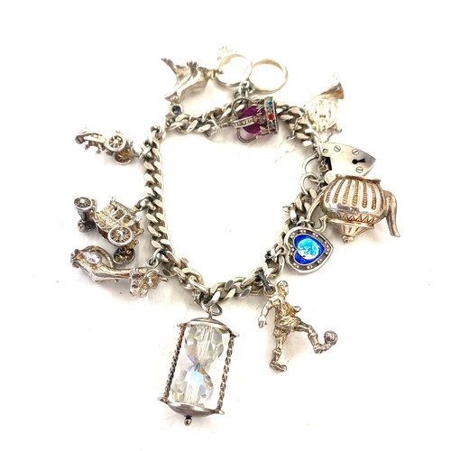 419 - Sterling silver charm bracelet, approximate weight 54g