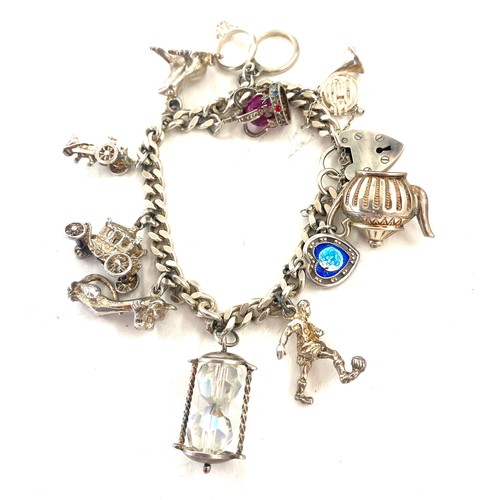 419 - Sterling silver charm bracelet, approximate weight 54g