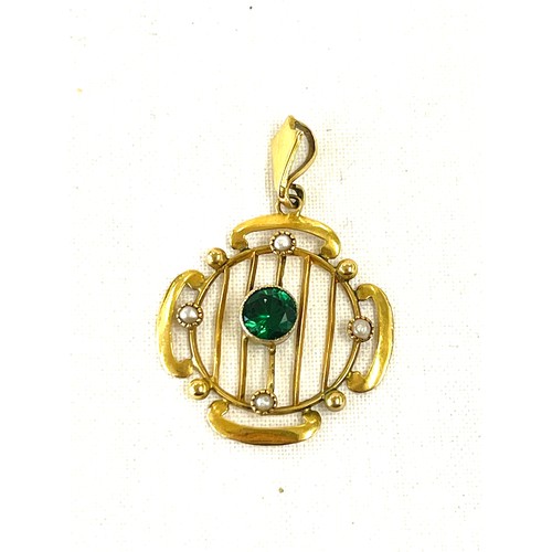 472 - Unmarked 9ct gold Edwardian pendant set with a central green stone and seed pearls, approximate weig... 