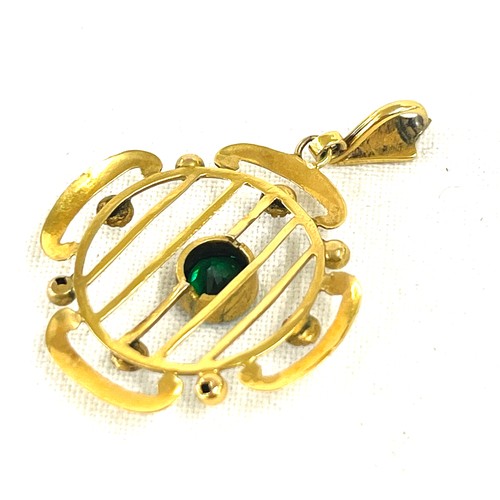 472 - Unmarked 9ct gold Edwardian pendant set with a central green stone and seed pearls, approximate weig... 