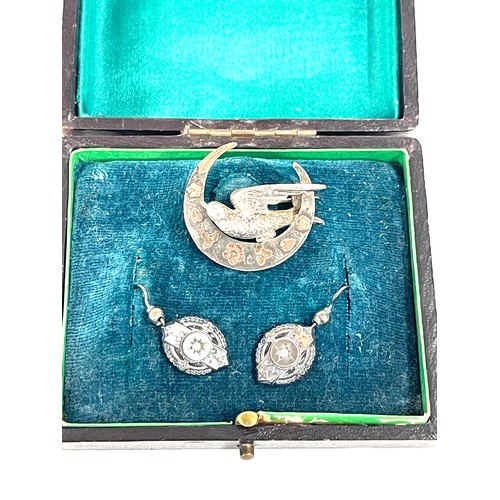 469 - Boxed Victorian silver earrings and brooch set