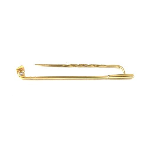 456 - Antique indistinctly marked 18ct gold and diamond golf club brooch, approximate weight 2.1g