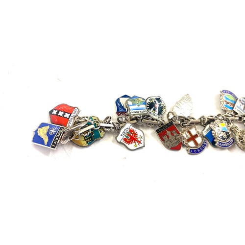 454 - Vintage silver and enamel charm bracelet, souvenir travel shield charms, approximate weight 46g