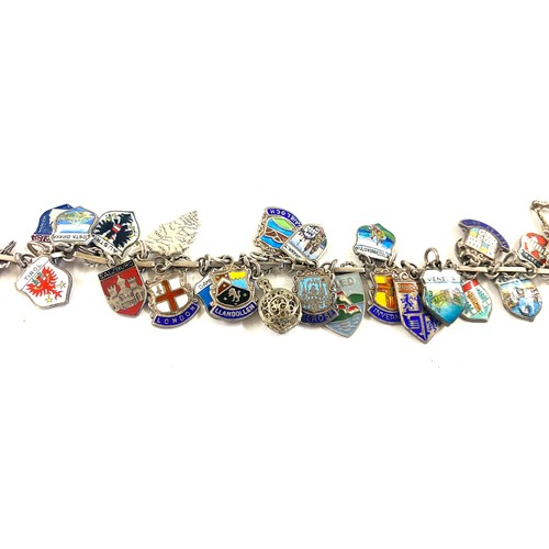 454 - Vintage silver and enamel charm bracelet, souvenir travel shield charms, approximate weight 46g