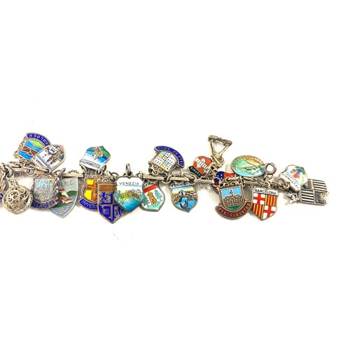 454 - Vintage silver and enamel charm bracelet, souvenir travel shield charms, approximate weight 46g