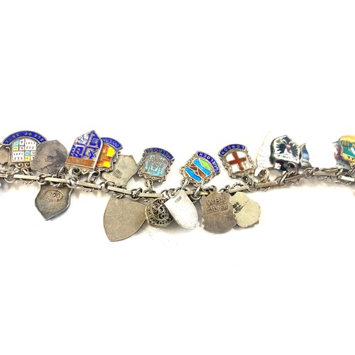 454 - Vintage silver and enamel charm bracelet, souvenir travel shield charms, approximate weight 46g