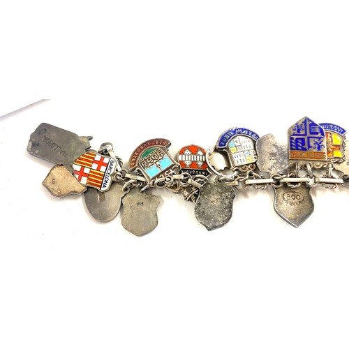 454 - Vintage silver and enamel charm bracelet, souvenir travel shield charms, approximate weight 46g