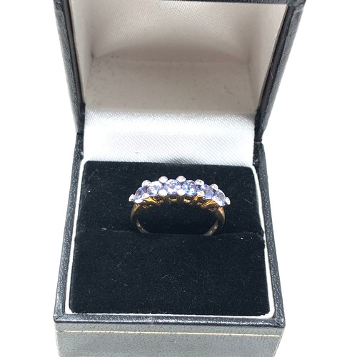 93 - 9ct gold tanzanite & diamond cluster dress ring (2.3g)