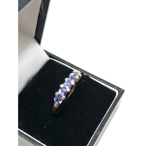 93 - 9ct gold tanzanite & diamond cluster dress ring (2.3g)