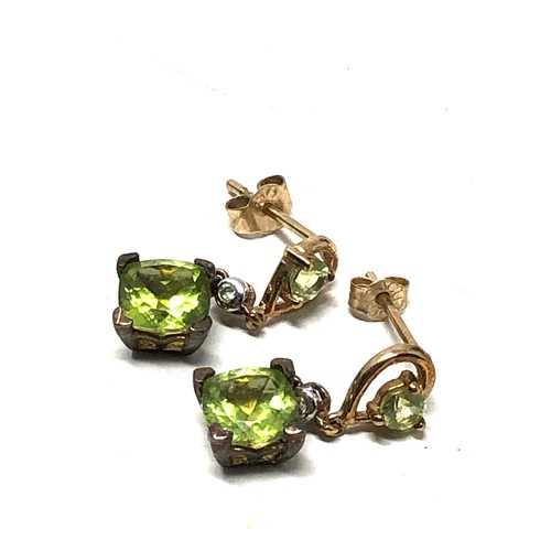 94 - 9ct gold peridot & diamond drop earrings (1.7g)