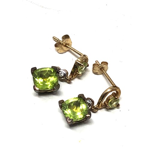 94 - 9ct gold peridot & diamond drop earrings (1.7g)