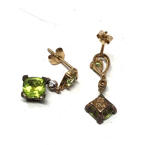 94 - 9ct gold peridot & diamond drop earrings (1.7g)