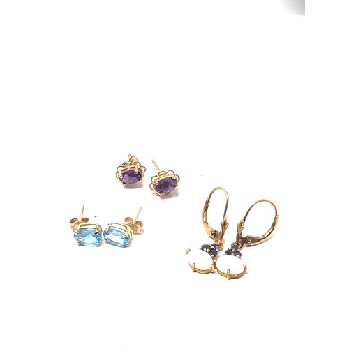 91 - 3 x 9ct gold paired gemstone stud earrings inc.  amethyst & sapphire