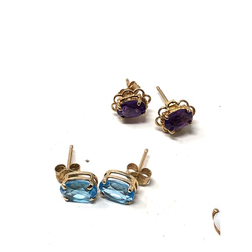 91 - 3 x 9ct gold paired gemstone stud earrings inc.  amethyst & sapphire