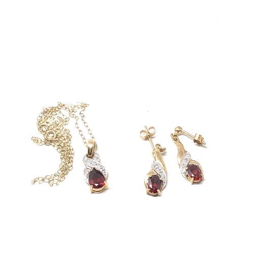 90 - 9ct gold garnet & diamond pendant necklace & drop earrings set (3.1g)