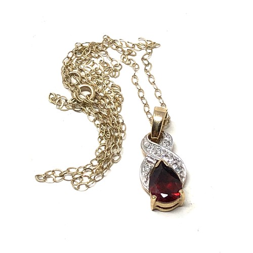 90 - 9ct gold garnet & diamond pendant necklace & drop earrings set (3.1g)