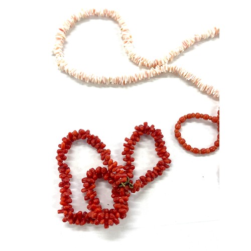 424 - 3 strings of coral beads, total approximate weight 61g, one has a 9ct gold clasp