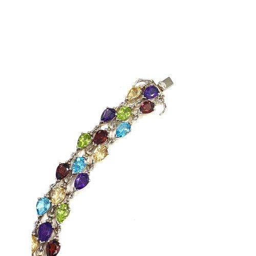 521 - Silver QVC bracelet set with multi coloured stones, approximate weight 25g