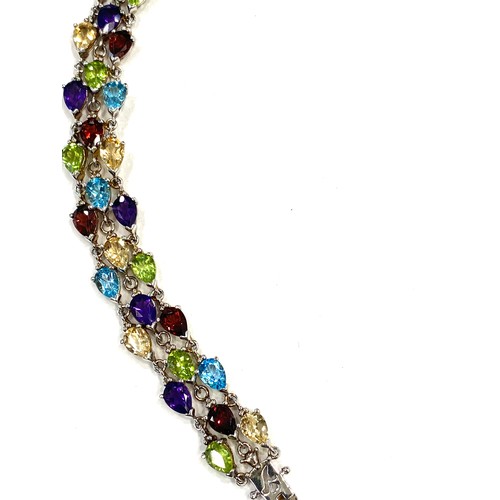 521 - Silver QVC bracelet set with multi coloured stones, approximate weight 25g