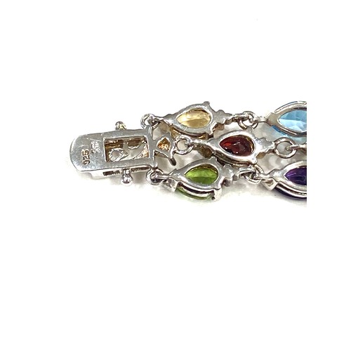 521 - Silver QVC bracelet set with multi coloured stones, approximate weight 25g